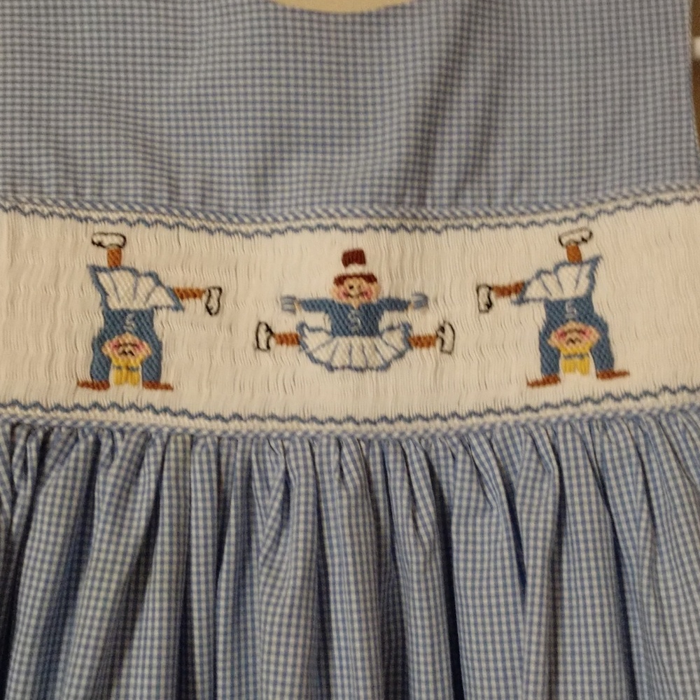 Remember Nguyen smocked cheerleader dress